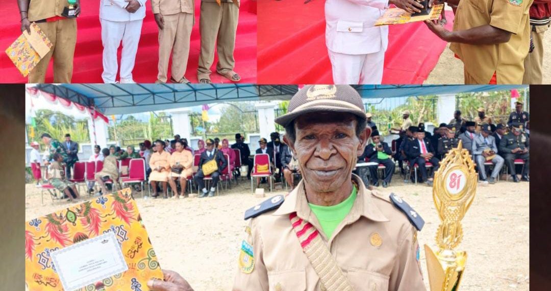 Kampung Abaimaida Raih Juara I Administrasi Terbaik, Bupati Yudas Tebai Serahkan Piala dan Uang Pembinaan